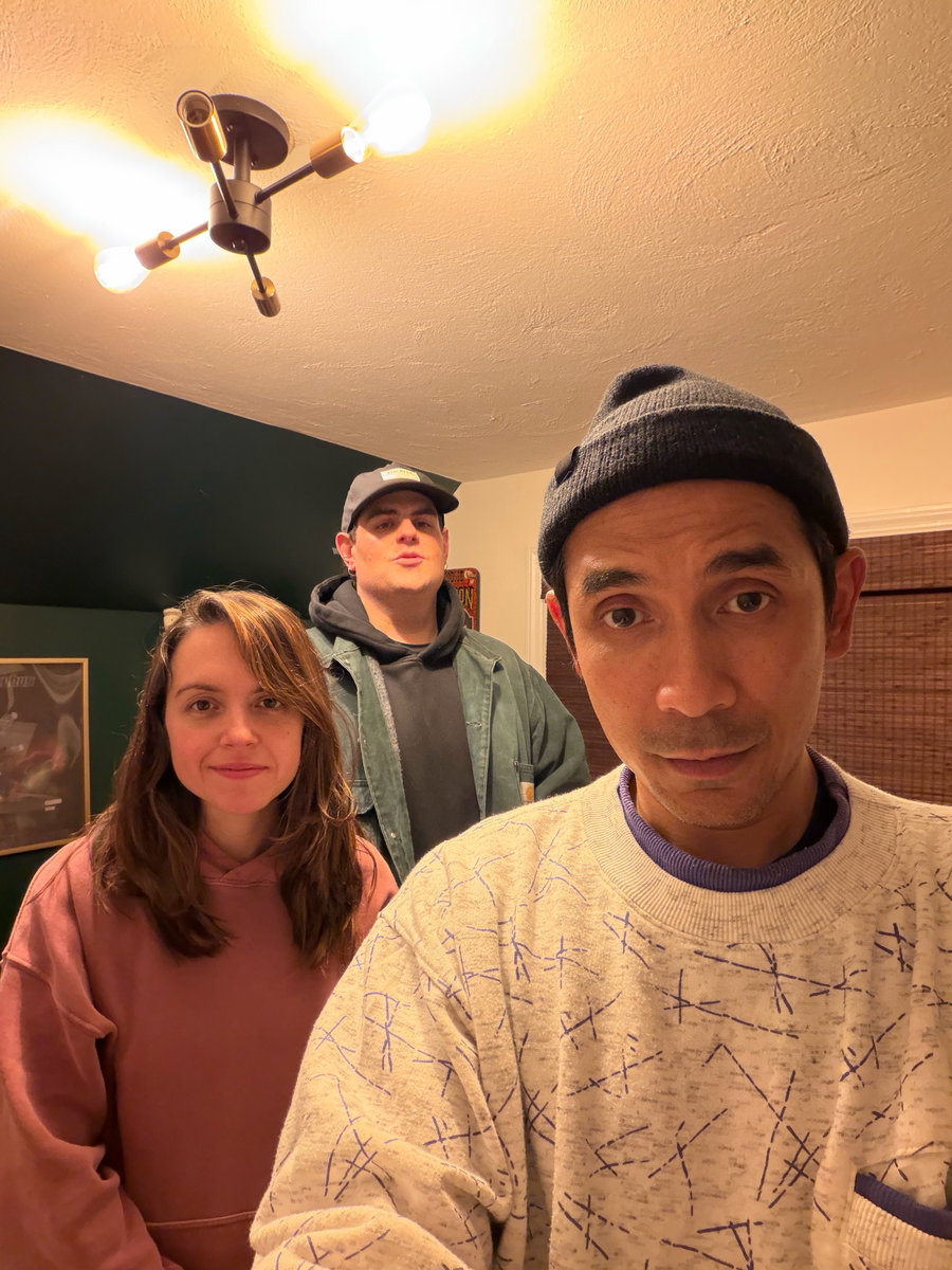 another band photo in a different kitchen